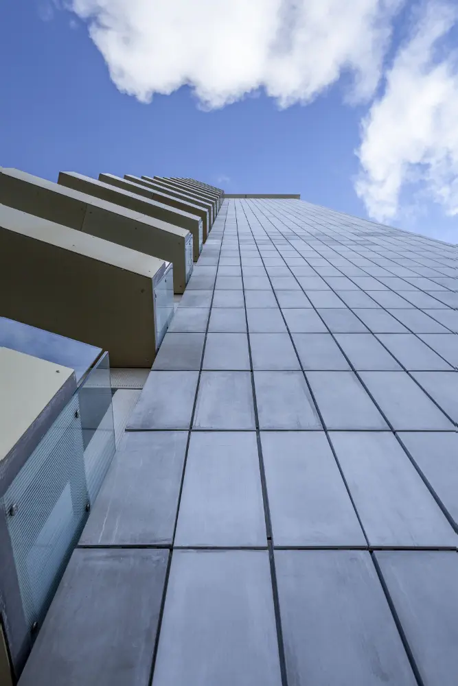 Modern commercial building featuring durable industrial tiling installation for long-lasting exterior performance in Melbourne.